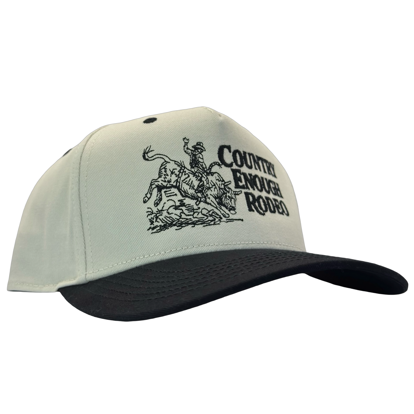 Legacy heritage snapback hat with graphic of bull rider on a bucking bull and the words country enough rodeo #black