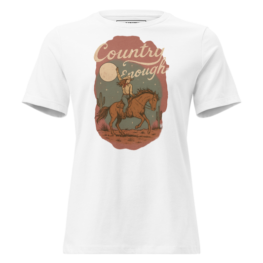 White t-shirt with cowgirl and horse graphic featuring a western landscape under moon and stars #white