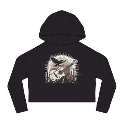 Black crop hoodie with a graphic of a guitar, a soaring desert bird, cactus silhouettes, and a sunset over a winding road #black