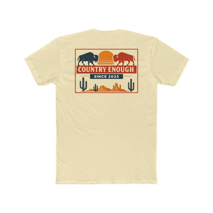 Natural t-shirt with graphic of mirrored bison in red and blue, sun, desert landscape, cacti, and the words country enough since 2025 #natural