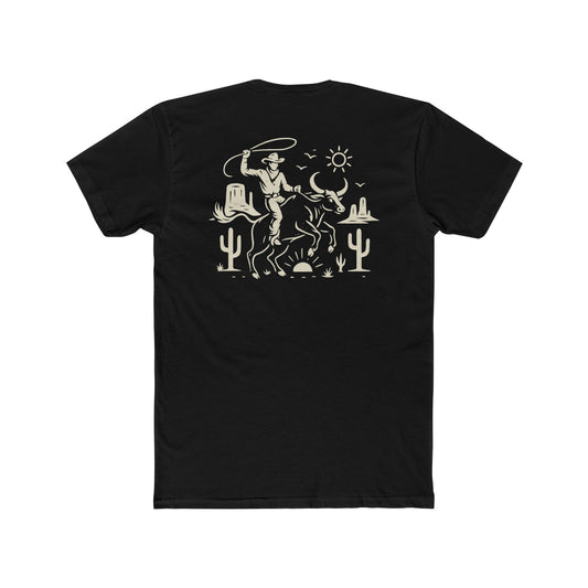 Black t-shirt with graphic of a cowboy lassoing on top of a bull in a desert landscape #black