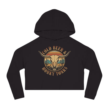 Black crop hoodie with graphic of longhorn, cacti, and mountains over a retro background with words cold beer and honky tonks #black