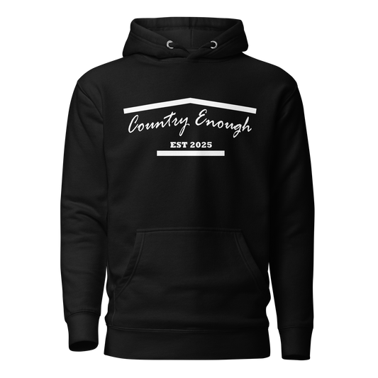 Black hoodie with graphic of the outline of a house and the words country enough est 2025 #black
