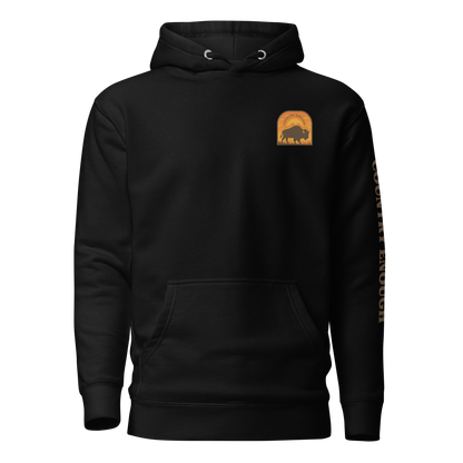 Black hoodie with a chest logo that includes a based, sunset, mountains, and the words country enough #black