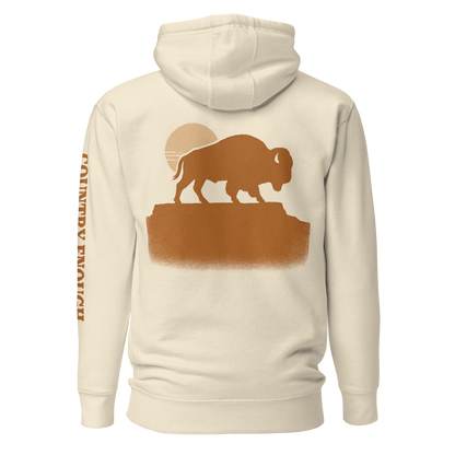 Bone hoodie with graphic of bison atop a plateau, the sun behind, and the words country enough #bone