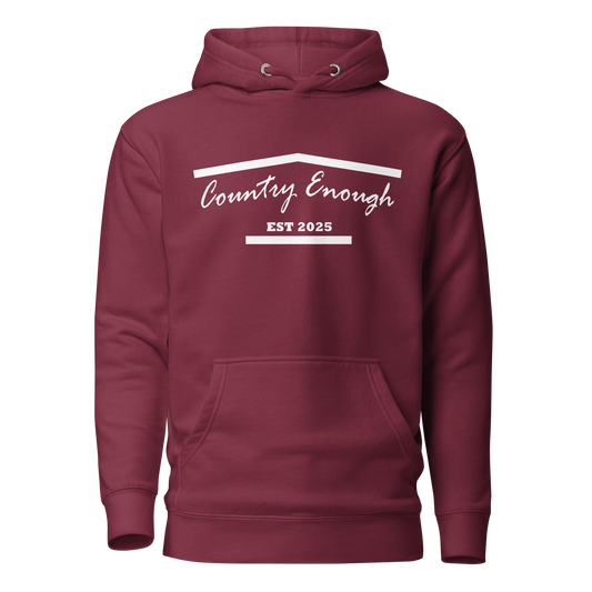 Maroon hoodie with graphic of the outline of a house and the words country enough est 2025 #maroon