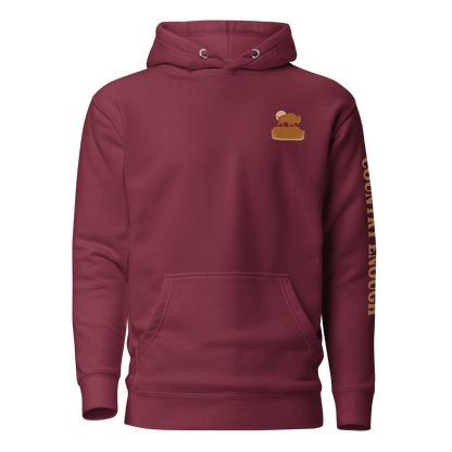 Maroon hoodie with graphic of bison atop a plateau, the sun behind, and the words country enough #maroon