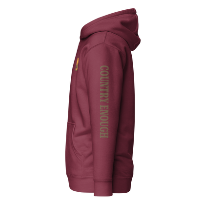 Maroon hoodie with a chest logo that includes a based, sunset, mountains, and the words country enough #maroon