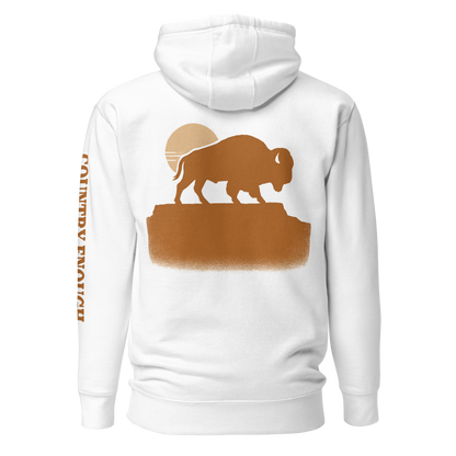 White hoodie with graphic of bison atop a plateau, the sun behind, and the words country enough #white