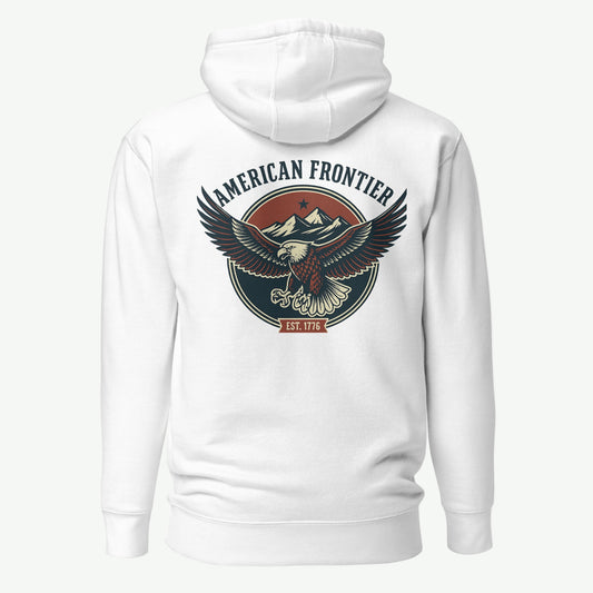White hoodie with an eagle and mountains in red, white, and blue with words American Frontier EST 1776 #white