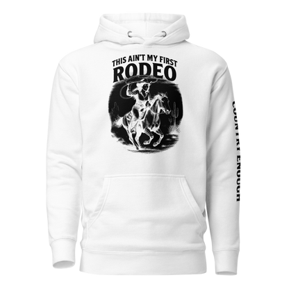 White hoodie with graphic of cowgirl and horse, western landscape, and words this ain't my first rodeo #white