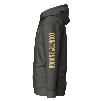 Vintage Black hoodie with circular graphic of a cowboy, horse, campfire, sun, cacti and desert landscape with words country enough #vintageblack