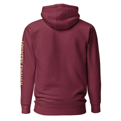 Maroon hoodie with circular graphic of a cowboy, horse, campfire, sun, cacti and desert landscape with words country enough #maroon