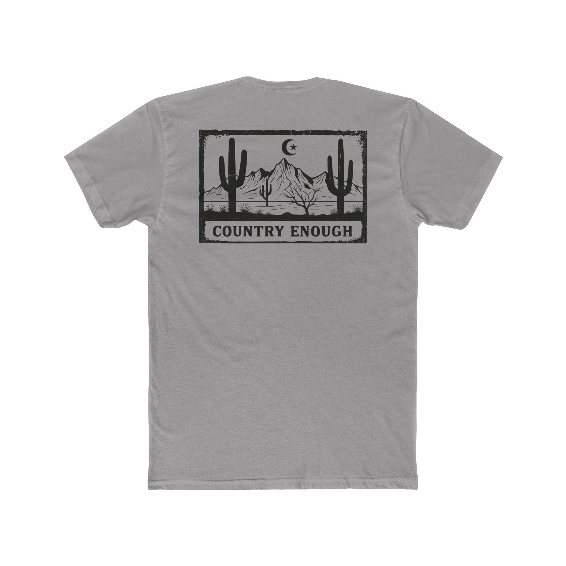 Gray t-shirt with graphic of mountains, cacti, and moon and star over a desert landscape with words country enough #gray