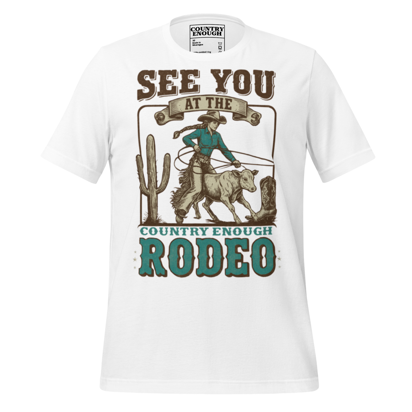 White t-shirt with graphic of cowgirl, calf, cactus, cowboy boot, and words see you at the rodeo #white