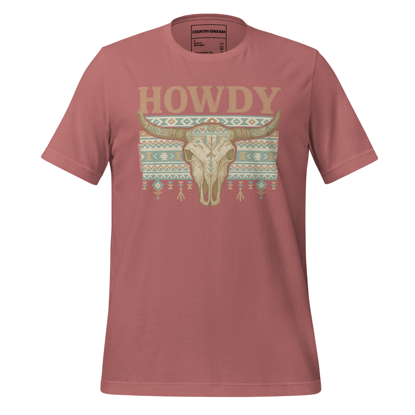 Mauve t-shirt with graphic of bull skull, aztec pattern, and words howdy across the top #mauve