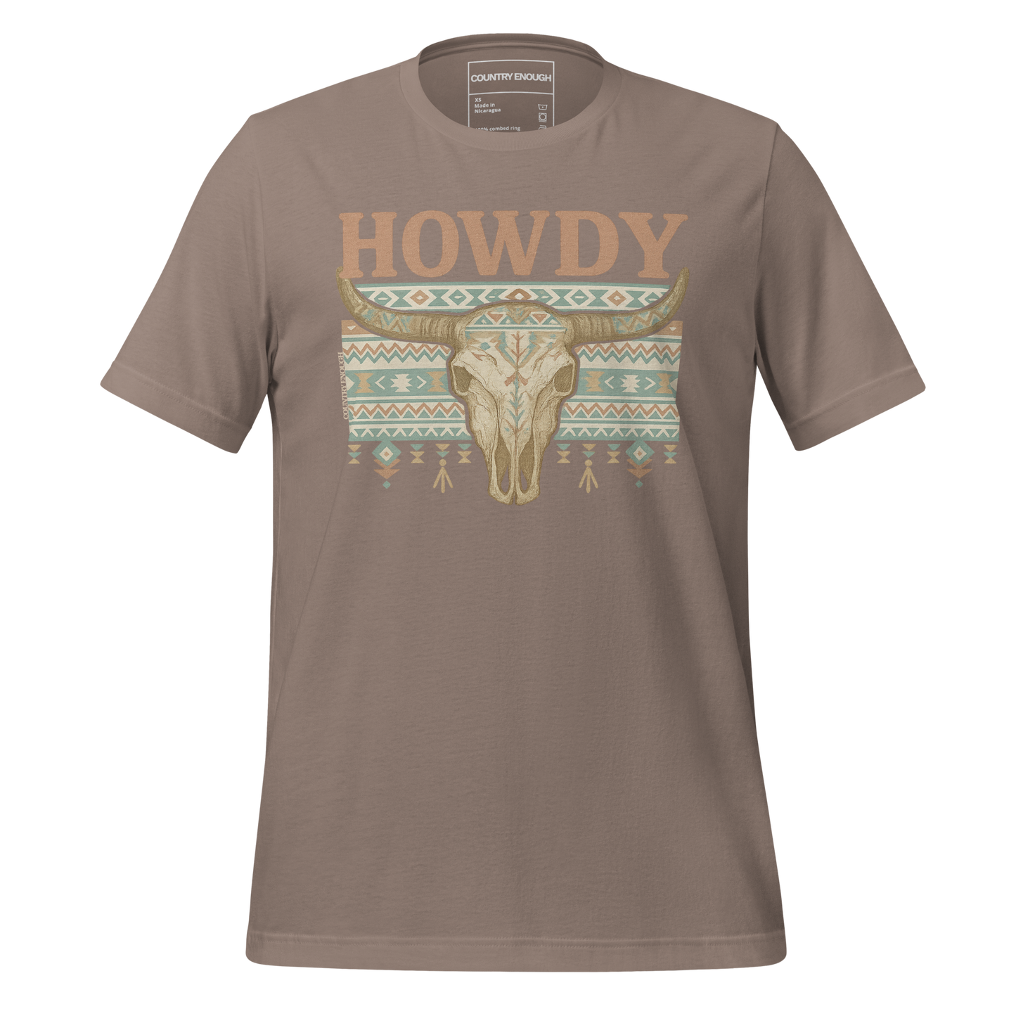Pebble t-shirt with graphic of bull skull, aztec pattern, and words howdy across the top #pebble