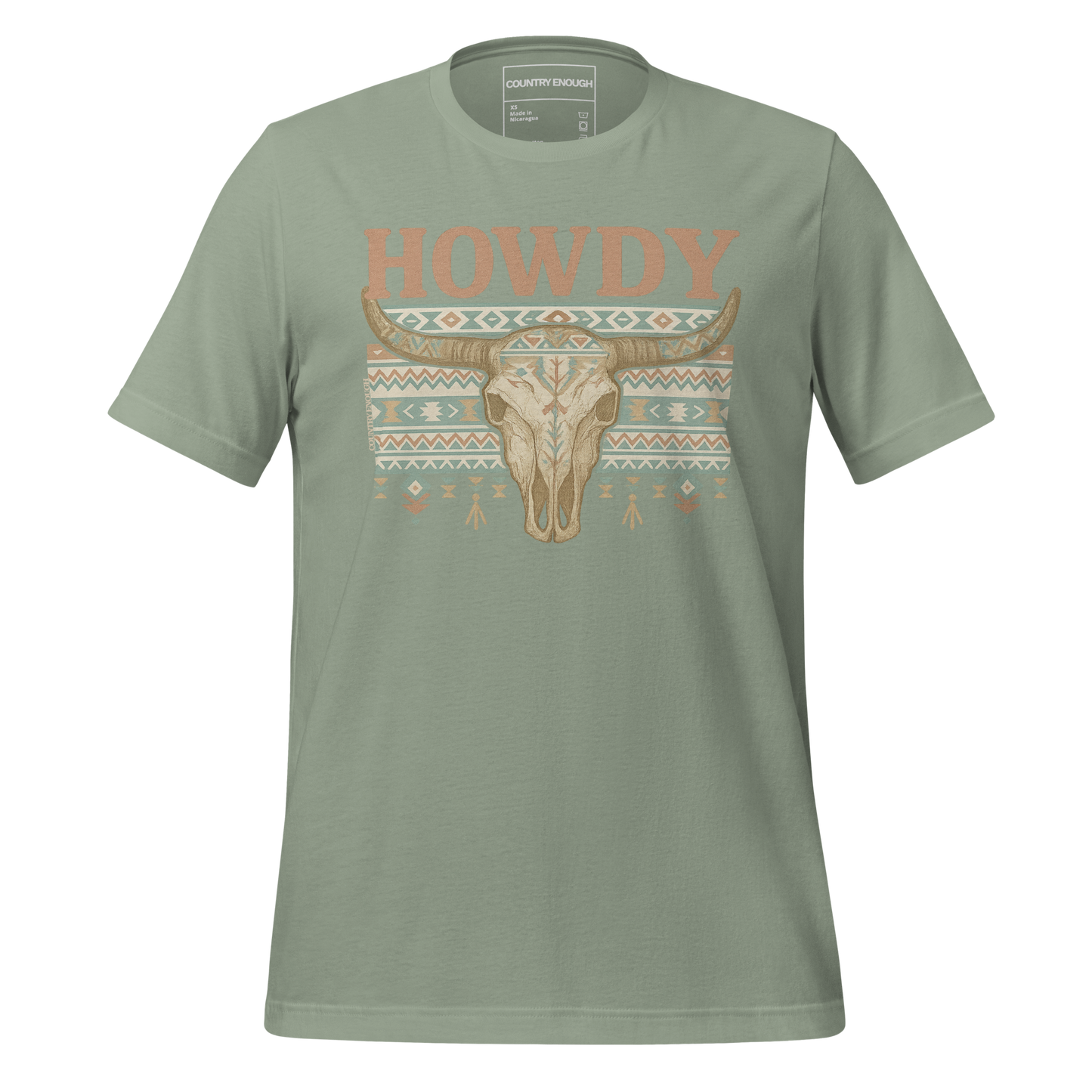 Sage t-shirt with graphic of bull skull, aztec pattern, and words howdy across the top #sage