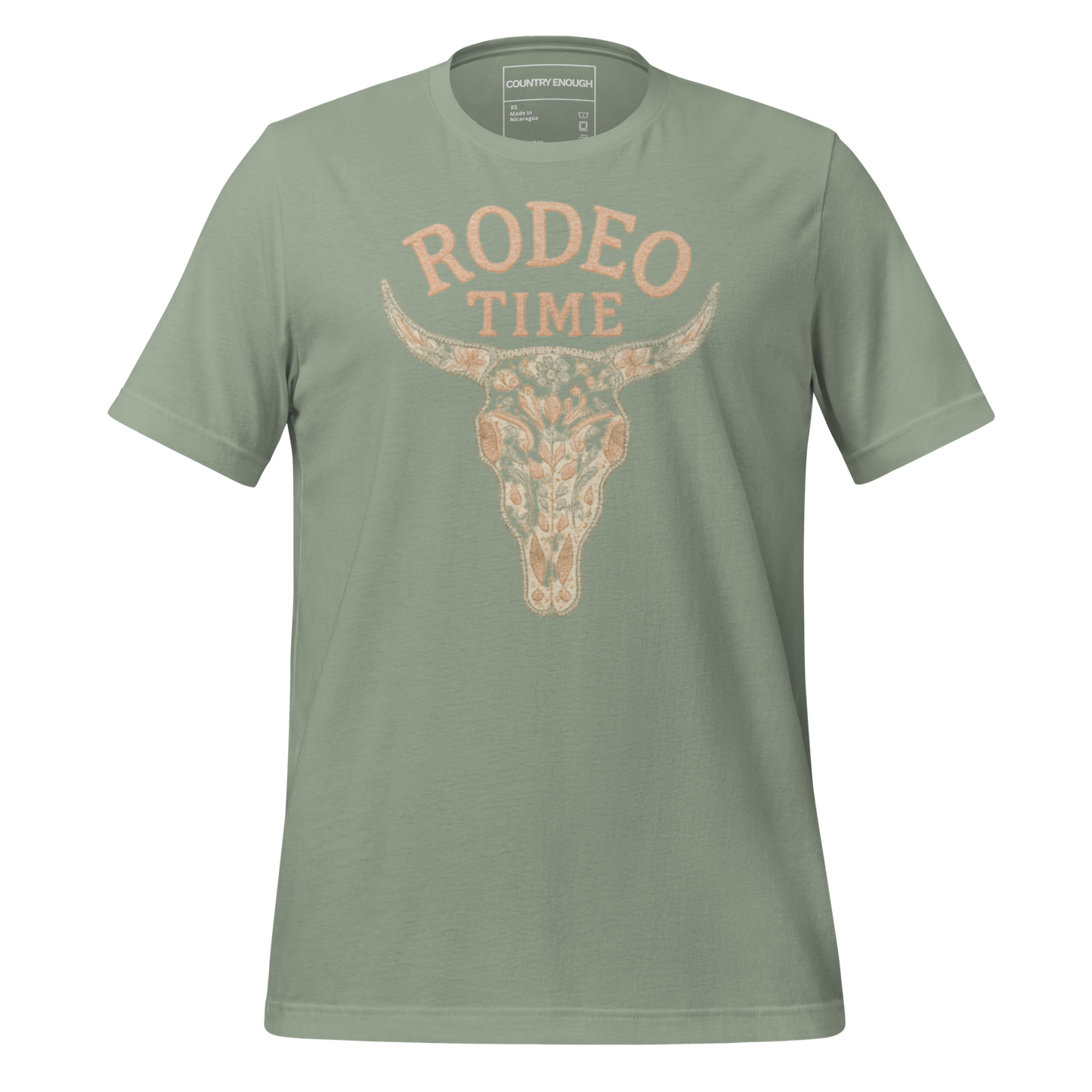 Sage t-shirt with graphic of a bull skull filled with flower pattern and the words rodeo time above #sage