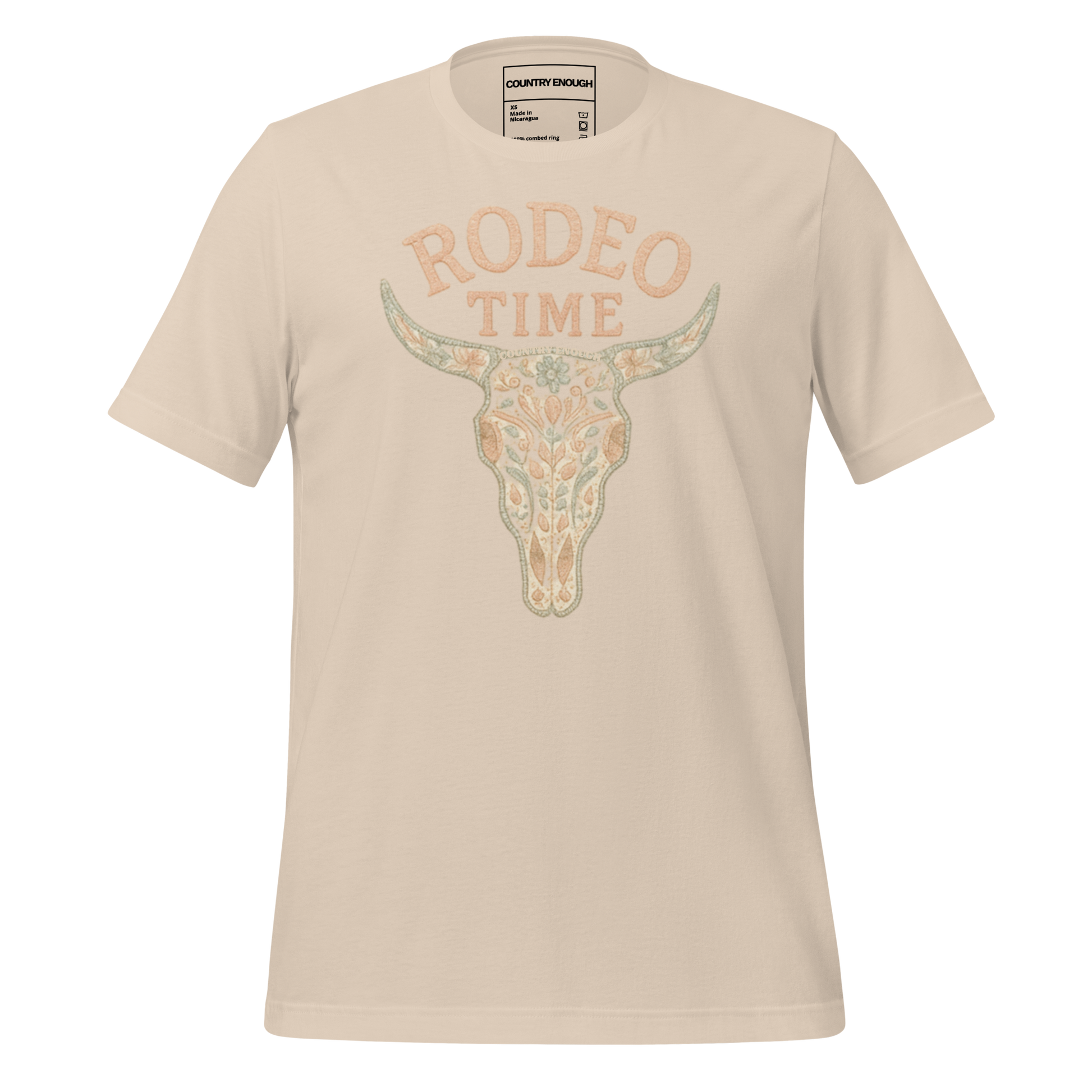 Cream t-shirt with graphic of a bull skull filled with flower pattern and the words rodeo time above #cream
