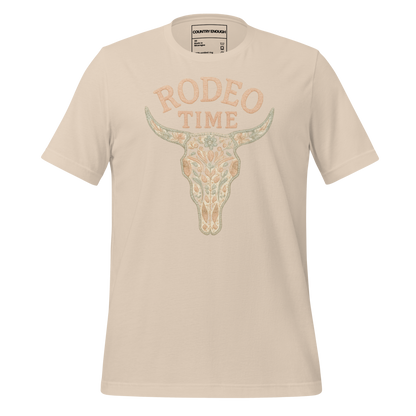 Cream t-shirt with graphic of a bull skull filled with flower pattern and the words rodeo time above #cream