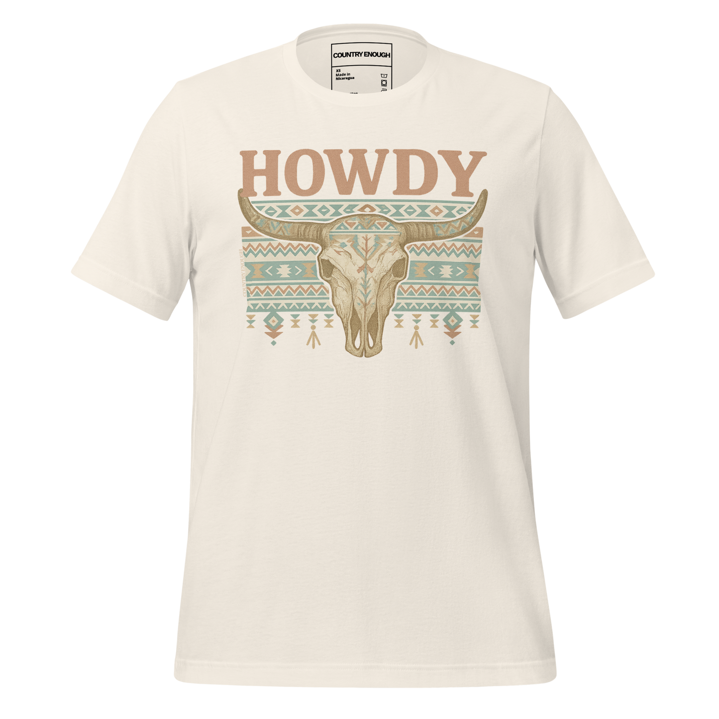 Vintage White t-shirt with graphic of bull skull, aztec pattern, and words howdy across the top #vintagewhite