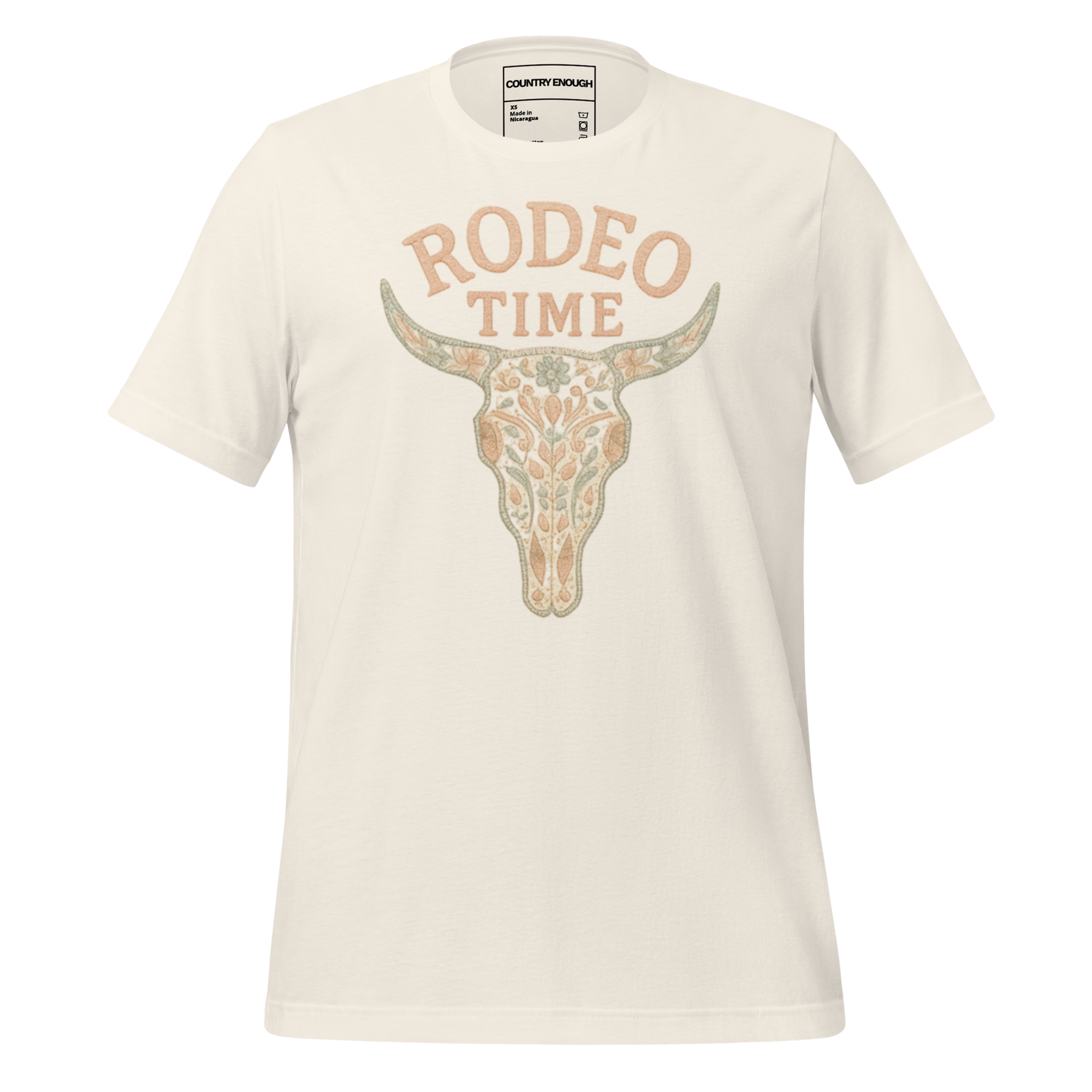Vintage White t-shirt with graphic of a bull skull filled with flower pattern and the words rodeo time above #vintagewhite