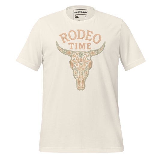 Vintage White t-shirt with graphic of a bull skull filled with flower pattern and the words rodeo time above #vintagewhite