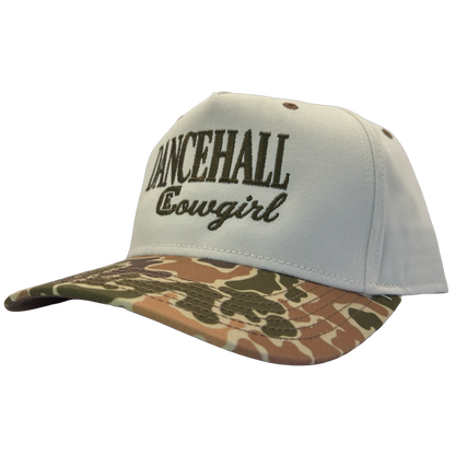 legacy heritage snapback hat with the words dancehall cowgirl and graphic of CE logo #duckcamo