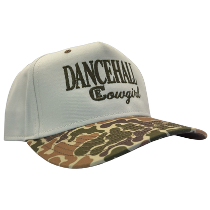 legacy heritage snapback hat with the words dancehall cowgirl and graphic of CE logo #duckcamo