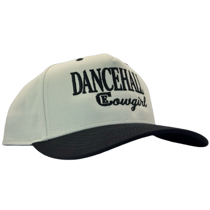 legacy heritage snapback hat with the words dancehall cowgirl and graphic of CE logo #black