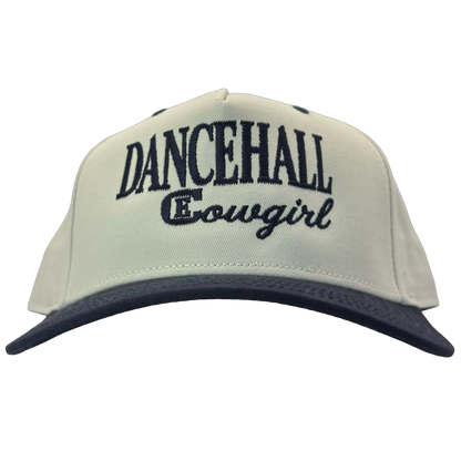 legacy heritage snapback hat with the words dancehall cowgirl and graphic of CE logo #navy