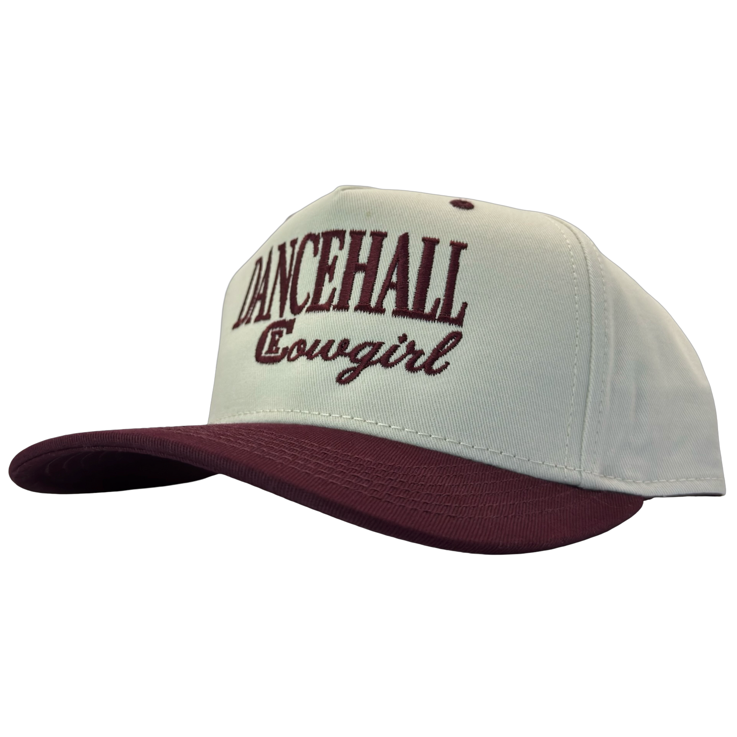 legacy heritage snapback hat with the words dancehall cowgirl and graphic of CE logo #wine