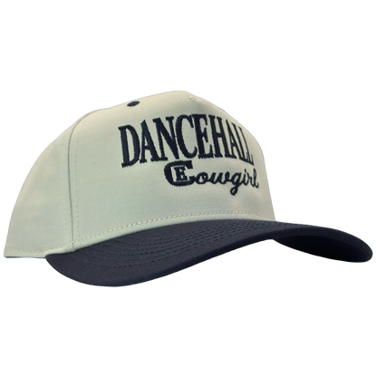 legacy heritage snapback hat with the words dancehall cowgirl and graphic of CE logo #navy