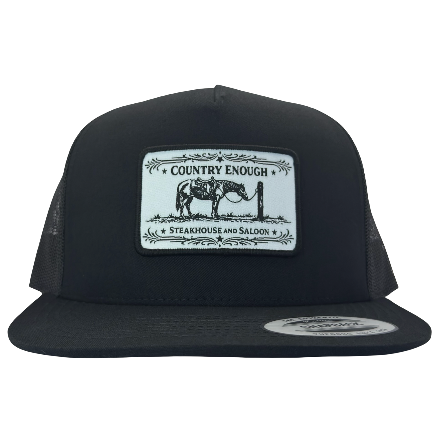 Yupoong 6006 flat bill snapback with a patch that contains a graphic of a horse and says the words country enough steakhouse and saloon #black