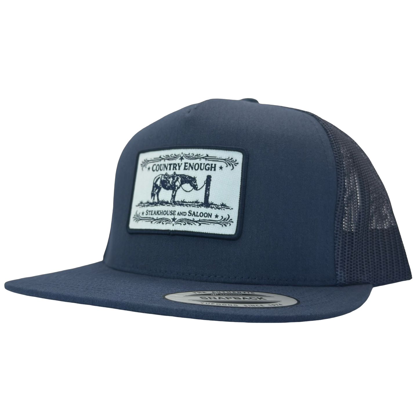Yupoong 6006 flat bill snapback with a patch that contains a graphic of a horse and says the words country enough steakhouse and saloon #navy