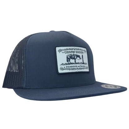 Yupoong 6006 flat bill snapback with a patch that contains a graphic of a horse and says the words country enough steakhouse and saloon #navy