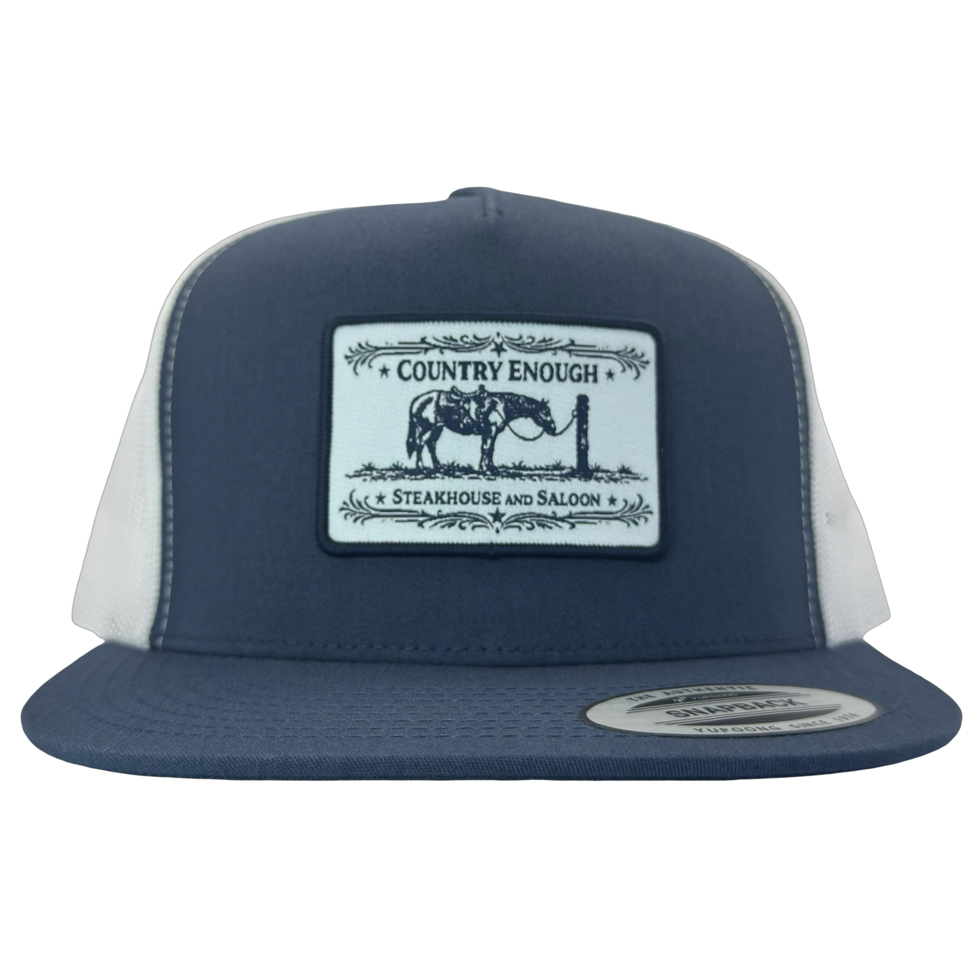 Yupoong 6006 flat bill snapback with a patch that contains a graphic of a horse and says the words country enough steakhouse and saloon #navy/white