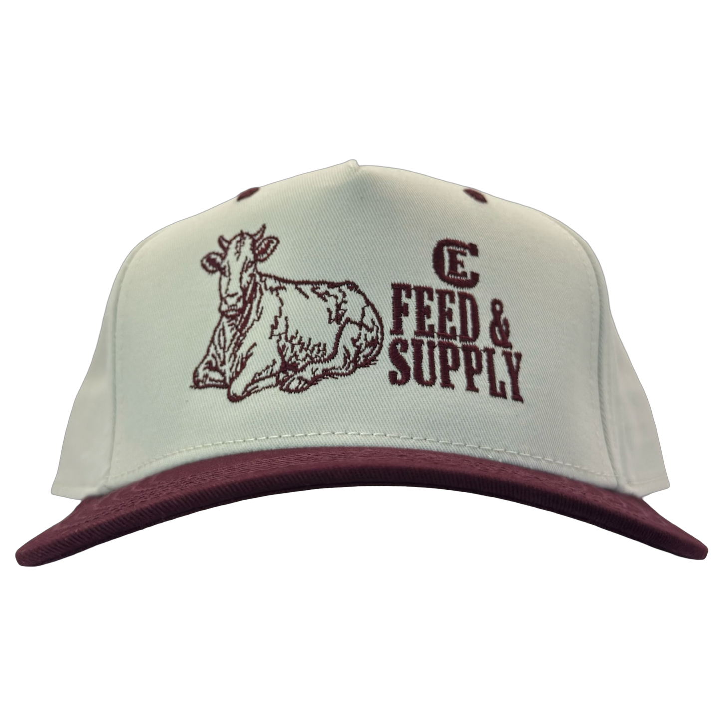 Legacy Heritage HTA snapback with graphic of a cow and the words feed & supply with CE logo #wine