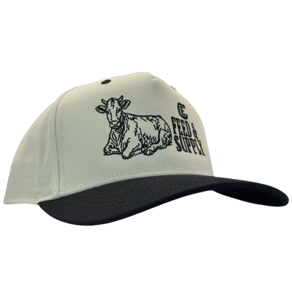 Legacy Heritage HTA snapback with graphic of a cow and the words feed & supply with CE logo #black