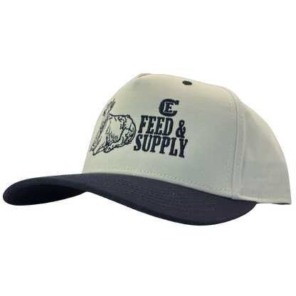 Legacy Heritage HTA snapback with graphic of a cow and the words feed & supply with CE logo #navy