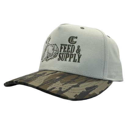 Legacy Heritage HTA snapback with graphic of a cow and the words feed & supply with CE logo #bottomland