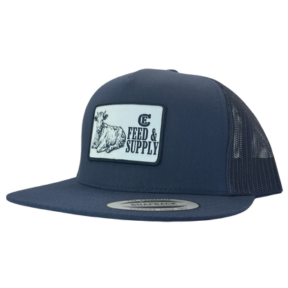 Yupoong 6006 snapback hat with patch that contains graphic of a sitting cow, the words Feed & Supply, and the CE logo. #navy