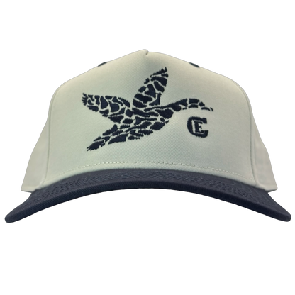 legacy heritage hta snapback with graphic of flying duck in a duck camo pattern with CE logo #navy