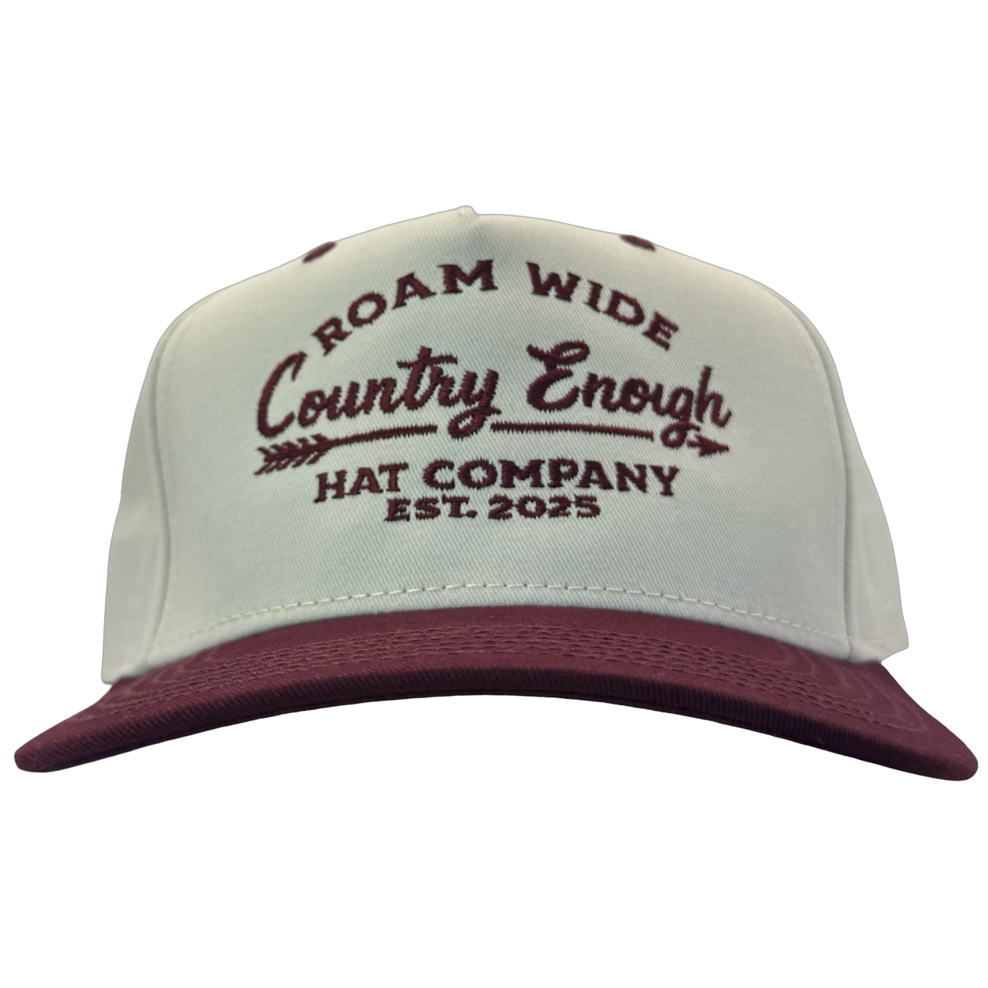 legacy heritage snapback with graphic of arrow and words roam wide, country enough hat company est. 2025 #wine