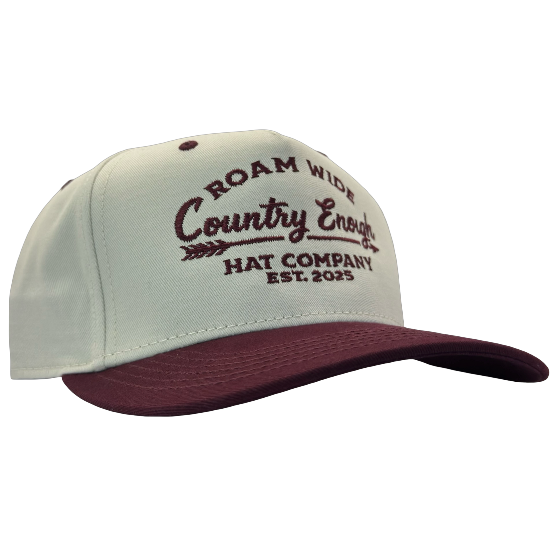 legacy heritage snapback with graphic of arrow and words roam wide, country enough hat company est. 2025 #wine