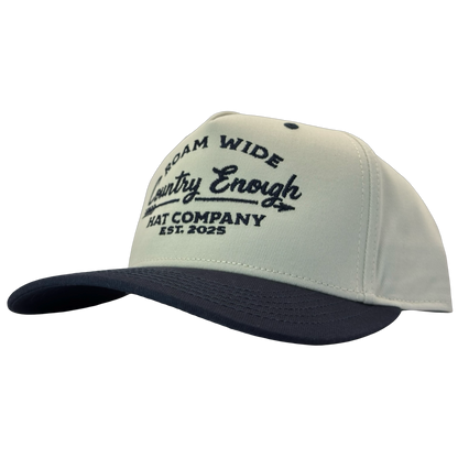 legacy heritage snapback with graphic of arrow and words roam wide, country enough hat company est. 2025 #navy