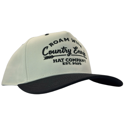 legacy heritage snapback with graphic of arrow and words roam wide, country enough hat company est. 2025 #black