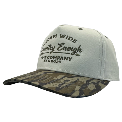 legacy heritage snapback with graphic of arrow and words roam wide, country enough hat company est. 2025 #bottomland
