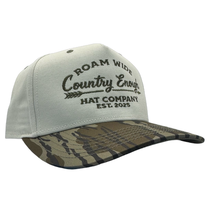 legacy heritage snapback with graphic of arrow and words roam wide, country enough hat company est. 2025 #bottomland